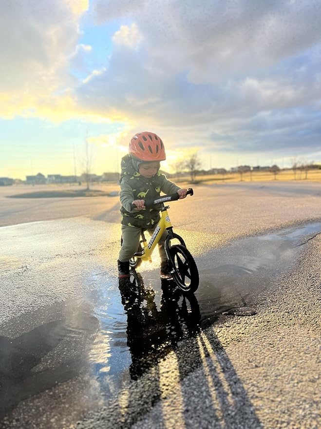 Strider 12” Sport Bike - No Pedal Balance Bicycle for Kids 1 to 4 Years - Includes Safety Pad, Padded Seat, Mini Grips & Flat-Free Tires - Tool-Free Assembly & Adjustments